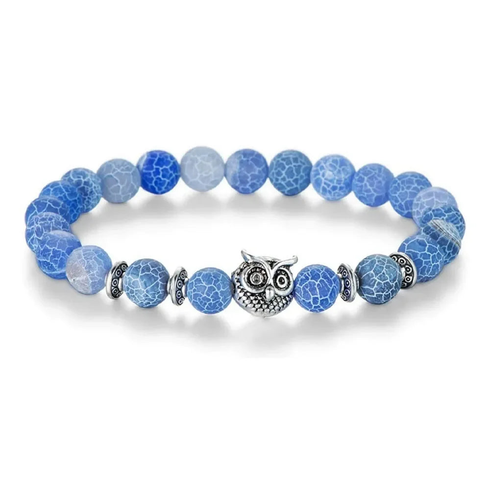 Blue crackle agate bead bracelet with silver owl charm and decorative spacer beads